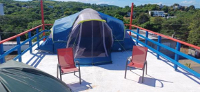 Rooster Run Glamping Camping has rooftop and off the ground Glamping experience for 1 to 16 in a single tent and views of The Rain Forrest and to Culebra across the Atlantic Ocean w Tents, Linens, Del